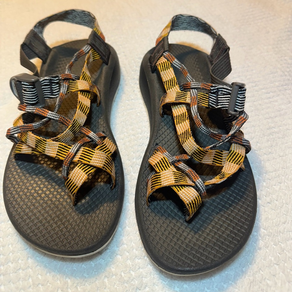 Chaco Black and Gold Strappy Sandals